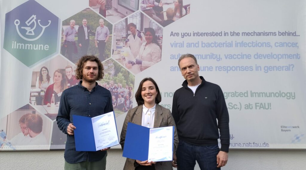 Lukas, Chiara and Prof. Nimmerjahn in front of the institute