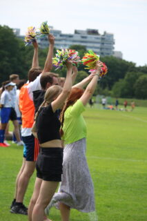 Close-up of the cheerleaders while cheering.