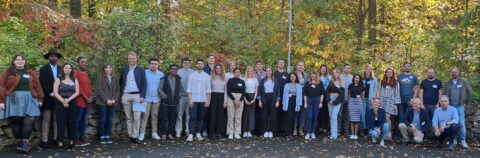 New students, faculty and students from former cohorts in front of the institute at the introductory event